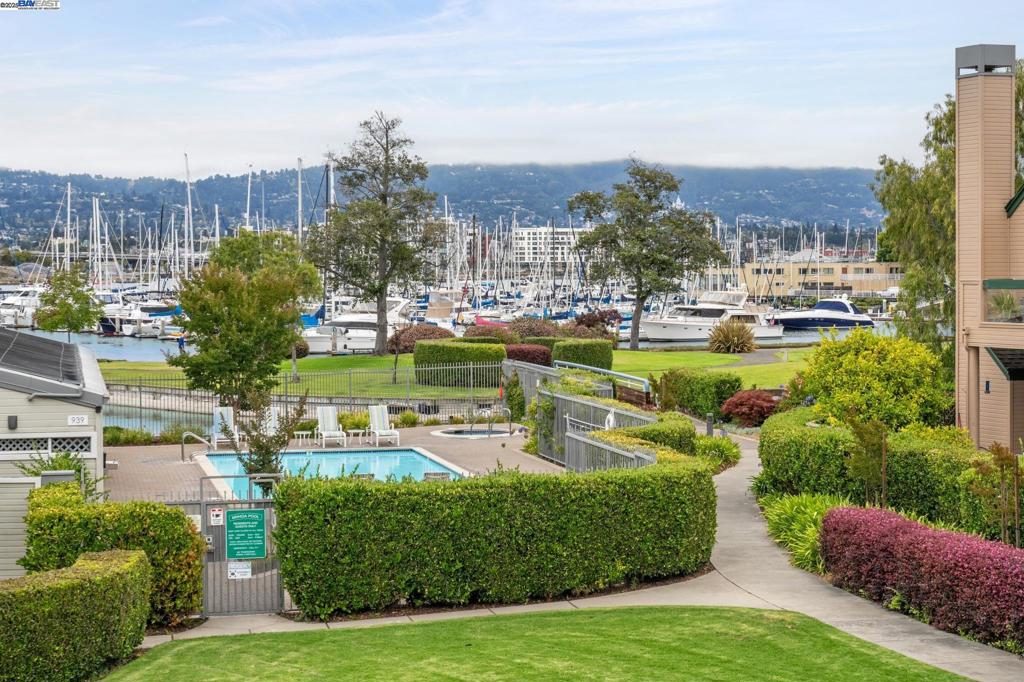 Marina Village 2 bed/2 bath upper condo w/parklike setting and marina views! Vaulted ceilings throughout makes this home feel so spacious. All new kitchen appliances, freshly painted, new carpeting and refinished hardwood flooring. Convenient location with many beautiful walking paths, lagoon and estuary views, and wildlife (turtles, ducks, egrets, turkeys, butterflies, and the list goes on!) A short distance to the Marina Village Shopping Center. Located near the Posey Tube, Ferry Station to SF, Marina Village Shopping Center and Alameda Landing Shopping Center.
