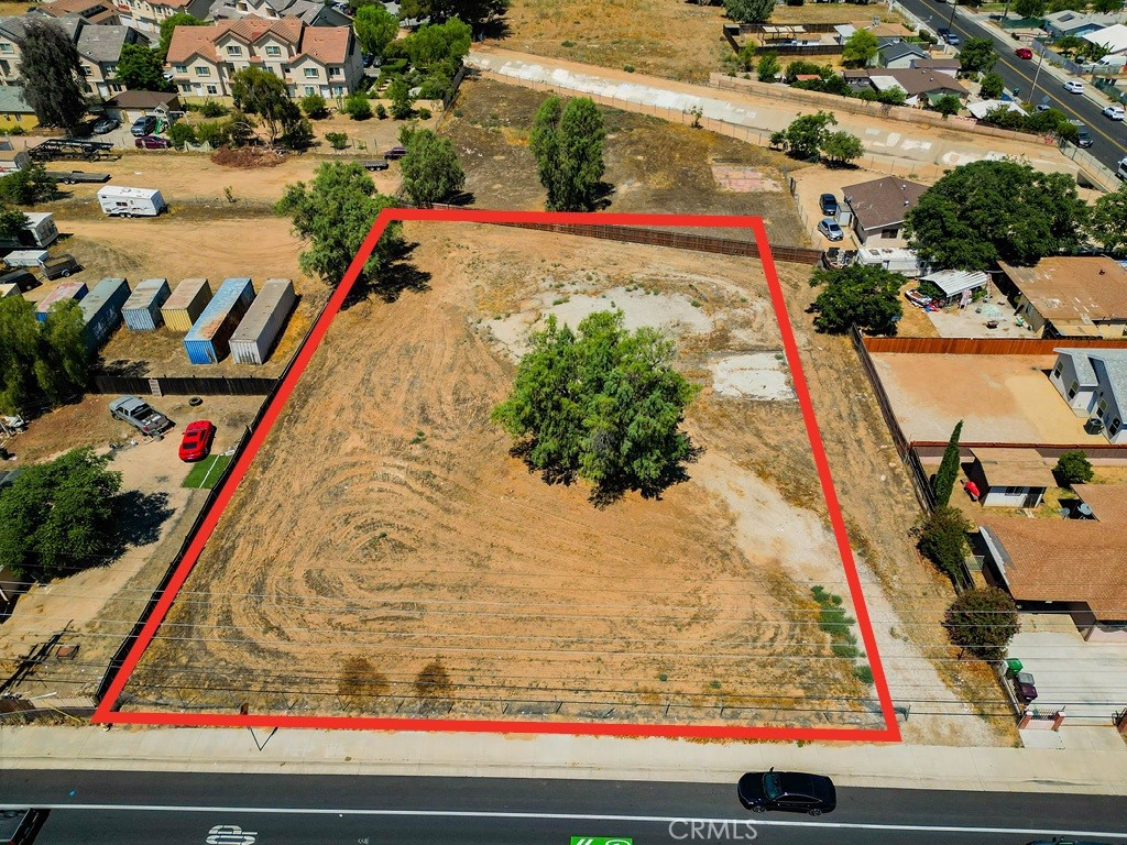 Opportunity Zone. One of the last remaining undeveloped parcels in this area, this site is part of the Village Specific Plan and thus you could potentially do twelve units, i.e. two or three story townhomes or single family homes. Buyer to verify all with architect, city, et al. Five minutes from the 60 freeway and major retail such as the new Sprouts market. Just a short drive to all the major retail at Towngate, such as Target, Lowes, Walmart, Winco, Costco, et al. Site is a nice flat rectangle. Full marketing package available, please contact agent.