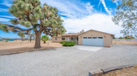 Photo of 1823 Hilton Avenue, Yucca Valley, CA 92284 (MLS # 219147518DA)