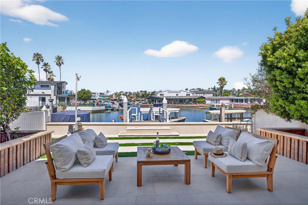 Experience unparalleled waterfront living at 613 36th Street, Newport Beach. Situated in the widest part of the Newport Beach channel, this remarkable property offers infinity water views that are truly one-of-a-kind. With no obstructions in front, homeowners can enjoy panoramic vistas of the expansive waterway, making this residence a rare gem.
Boasting three bedrooms and a fully functional kitchen within the guest quarters. The guest quarters offer an ideal space for visitors, ensuring privacy and convenience for all.
The property's prime location provides easy access to and from the private dock, accommodating larger vessels with ease. Whether you're an avid sailor or enjoy leisure boating, the spacious surrounding water makes navigation a breeze.
Don't miss the opportunity to own this extraordinary waterfront home, privacy, and breathtaking views converge.