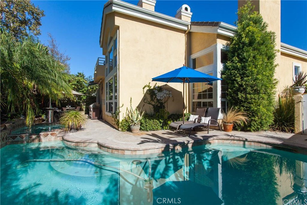 Welcome to beautiful pool house at the exclusive guard gated community of Dove Canyon! Featuring 4 bedrooms 4 bathrooms and a corner lot location with over 7,000 square feet. A down stairs bedroom perfect for the in laws, office or additional living space for that growing family. With an open floor plan throughout the main floor, you can't wait to have guests over to entertain especially in the oversized kitchen. Plenty of counter space showcasing granite counters, upgraded appliances and a panoramic view of the backyard. Step inside and you'll be enveloped by the high ceilings filled with tons of natural light showcasing the neutral paint in the formal living and dining rooms. Upstairs you'll find a huge master bedroom boasting vaulted ceilings, fireplace and additional seating area too. The 2nd and 3rd bedrooms both offer their own private en-suite and panoramic views of the Saddleback mountains. Kids ready for summer and looking for a place to have fun? Check out this custom pool, fireplace and wrap around back yard ready for the summer BBQ. Offering everything that Dove Canyon has to offer including community pool and spa, this home has it all!.