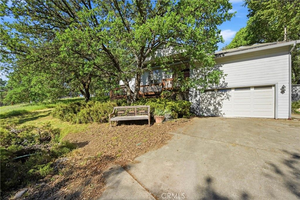 Photo of 19552 Powder Horn Rd, Hidden Valley Lake, CA 95467 (MLS # LC26065068)