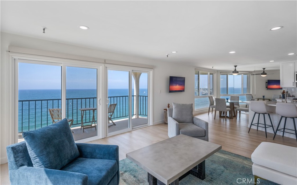 Fully furnished and recently remodeled panoramic ocean view and beachfront property with 180-degree balcony view from Palos Verdes to Santa Monica Mountains. Enjoy full ocean views from every window. You can hear the waves from your living room and kitchen. Feel the ocean air! You literally can't get closer proximity to the ocean. Situated on the third floor of the building, one-bedroom condo feels massive when your fourth wall is the great Pacific Ocean. Updated kitchen and bathroom. Covered, secured parking for 1 car. Community Jacuzzi and laundry. Spectacular location in the South Bay. Short walk to the Redondo Beach Pier and The Village restaurants, fish markets & farmer's market. Year-round beach living or your incredible getaway. To Live, Live by the Sea.