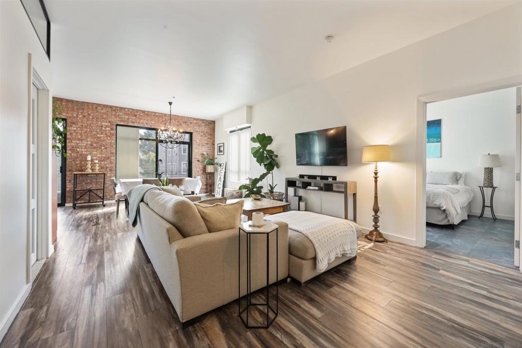 Downtown living at its BEST! This trendy loft-style condo at Aloft Cortez Hill has been transformed with a second bedroom, giving you the perfect mix of style and flexibility. Think soaring ceilings, dramatic windows, and a layout that feels both fresh and functional. The sleek kitchen opens to a bright living area that’s ready for dinner parties, movie nights, or just kicking back. Enjoy the convenience of ground-level access - no waiting for elevators, just step right into your urban retreat. Aloft brings the vibe with a resort-style pool, spa, fitness center, fire pit, and stylish lounge areas. Live at the center of it all - trendy shops, amazing restaurants, Petco Park thrills, and the vibrant energy of Little Italy are all waiting just around the corner.
