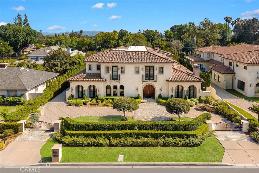 Welcome to this magnificent Italian estate, designed by renowned architect Robert Tong, nestled in the heart of Arcadia. This luxurious home features 6 bedrooms, 8 bathrooms and a 4-cars garage, all set on a 21,300 SF premium lot. Architectural masterpiece of modern luxury and comfortable living. When you stepped through the double doors entrance leads to the grand foyer with an enormous crystal chandelier. The high celling hall and modern style design allow you and your family to experience a luxurious lifestyle. Stylish touches include dark wood & inlaid marble floors and designer-select lighting fixtures. Downstair complete with a formal living room, a formal dining room, a junior master bedroom, a home office library, a home theater, Private elevator, a fitness Gym offer both sauna and bath, Chef's kitchen with top-of-line appliances and an adjacent wok kitchen, a game room with wine cellar. The upper level showcases a remarkable master suite. A sitting area with private office and spacious balcony. dual walk-in closets. a stunning master bath with double Sinkes, separate soaking tub and double wide shower. Step outside to your back yard, the beautifully landscaped garden, a spectacular patio with a fireplace. The resort inspired pool and spa gracefully compete the outdoor entertaining area. The house located within the award-winning Arcadia Unified School District and close to shopping, dining, golf courses, LA County Arboretum, Santa Anita racetrack. Schedule a private tour today to experience this remarkable estate for yourself.