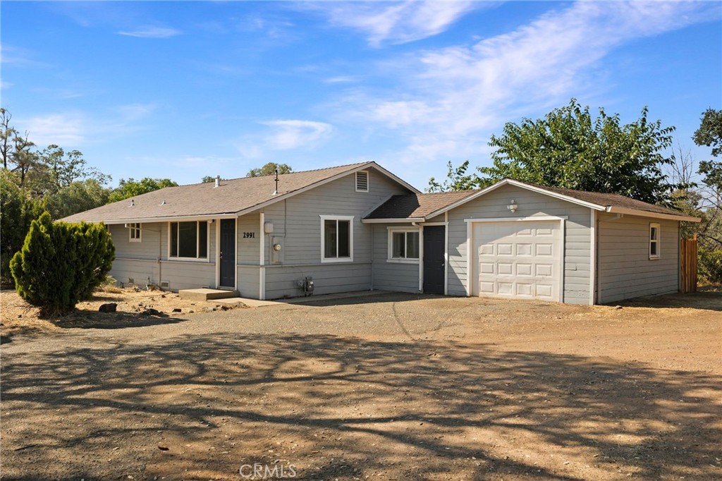 Cute home on a generous lot in City limits. This refreshed country home features quartz counter tops, stainless steel appliances, dual pane windows throughout, central heat and air, quartz slab shower surround, indoor laundry room, updated flooring, updated lighting and more. There is a breezeway between the home and the 2 car garage and also a deck in the large fully fenced backyard. This home is set to impress.