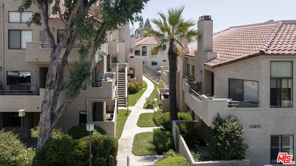 Charming 2-Bedroom Condo in the Heart of Thousand Oaks. Perfect for first-time buyers, this move-in ready home offers a rare combination of comfort and convenience. Enjoy sought-after features including indoor laundry, soaring vaulted ceilings, and an open-concept floor plan filled with natural light. The spacious living and dining areas flow seamlessly to a private balcony with beautiful views of the pool and Cal Lutheran University. Upstairs, you'll find two generously sized bedrooms, offering both privacy and comfort. The low HOA dues include fantastic amenities such as a sparkling swimming pool, and relaxing spa. Ideally located near shopping, dining, parks, and schools. This one won't last!
