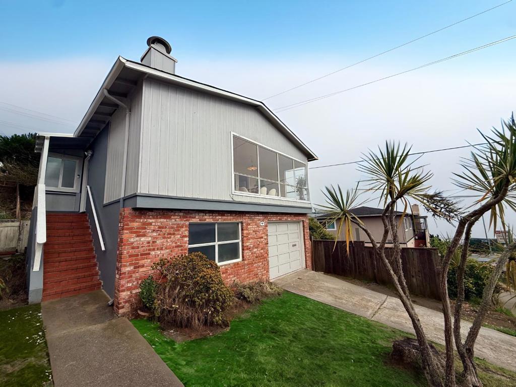Welcome to 95 Clearview Dr, a beautiful, well-maintained home for you to enjoy coastal living to the fullest. This 3 bedroom, 1 bathroom home offers breathtaking views of the ocean, as well as the gorgeous landscape of Pacifica. The upper level features 3 generously sized bedrooms, a lovely kitchen with a breakfast nook, and a living room with dining area for you to enjoy meals while taking in the gorgeous scenery of the ocean. Downstairs in the basement, is an expansive area with high ceilings to use as your blank canvas for your creative imagination, with opportunity to create more living space. The tandem two-car garage, plus additional driveway parking, provides ample storage and convenience. Enjoy the tranquility of a peaceful neighborhood, while remaining within easy reach of highly rated schools, shopping, and the surrounding Bay Area. This is a rare opportunity to own a slice of oceanfront paradise.