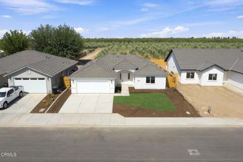 Photo of 609 Lawford Street, Shafter, CA 93263 (MLS # V1-38067)