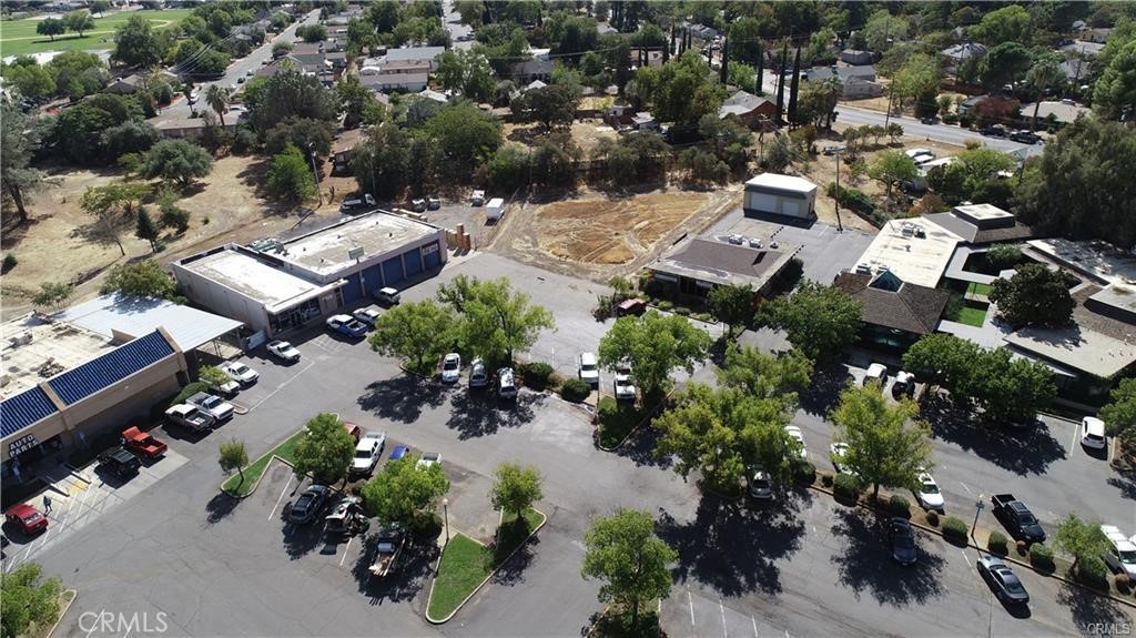 This prime 1.08-acre commercial parcel, zoned C2-Intensive Commercial, offers an exceptional opportunity for development. The property consists of a .47-acre commercial lot that is level with the street, ideal for retail, office, or other commercial uses, and a .61-acre adjacent parking lot with over 40 spaces, providing ample customer or tenant parking. The level topography ensures ease of construction and maximizes development potential. With flexible zoning allowing for a wide range of commercial uses, this property is perfectly suited for investors or developers seeking a high-visibility location with excellent infrastructure.