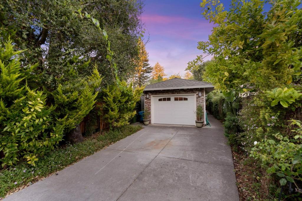 Welcome to 932 Lundy Lane, a rarely available home set on an expansive 9,100 sq ft lot in the sought-after Country Club neighborhood of Los Altos. This single-level residence offers 3 bedrooms and 2 bathrooms with soaring ceilings, exposed beams, and abundant natural light. A freshly painted interior and updated lighting create a bright, inviting atmosphere, while the living rooms 8-foot slider frames serene views of lush greenery, giving the home a hillside retreat feel. The backyard is a private oasis, perfect for relaxing or entertaining, with the convenience of being just minutes to top Los Altos schools, shopping, and major Silicon Valley employers. The Los Altos Hills experience nestled perfectly in Los Altos.