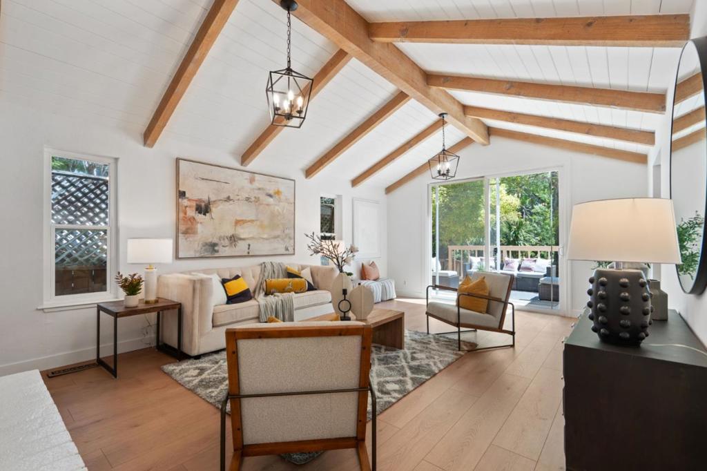 Welcome to 932 Lundy Lane, a rarely available home set on an expansive 9,100 sq ft lot in the sought-after Country Club neighborhood of Los Altos. This single-level residence offers 3 bedrooms and 2 bathrooms with soaring ceilings, exposed beams, and abundant natural light. A freshly painted interior and updated lighting create a bright, inviting atmosphere, while the living rooms 8-foot slider frames serene views of lush greenery, giving the home a hillside retreat feel. The backyard is a private oasis, perfect for relaxing or entertaining, with the convenience of being just minutes to top Los Altos schools, shopping, and major Silicon Valley employers. The Los Altos Hills experience nestled perfectly in Los Altos.