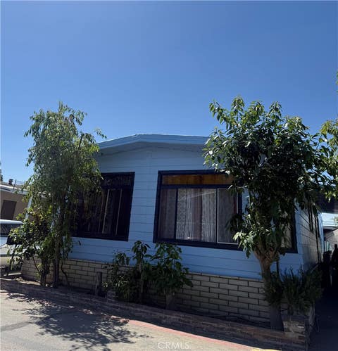 Photo of 1401 W 9th St #148, Pomona, CA 91766 (MLS # CV26086508)