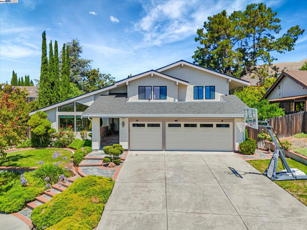 Rarely available luxury Weibel residence in one of Fremont’s most exclusive, sought-after & beautiful locations. Situated in a peaceful & private setting, on a tree lined court location with hill views. 5 bedroom, 3 full bathroom (1 spacious bedroom & full bathroom downstairs), 3-car garage home located on a large approx. 10,317 sqft premium lot offering an open floor plan & many custom updates. The double entry door opens to the formal living room with soaring high ceilings, skylight & large windows for natural light. Separate dining room perfect for entertaining. Custom remodeled gourmet kitchen with solid wood cabinetry, granite slab counters, custom tiles backsplash, breakfast bar, full pantry, top-quality appliances & breakfast nook with bay window. Generous family room open to the kitchen offers an elegant fireplace & a French door to the beautiful backyard patio. Additional fine features include updated luxury flooring throughout, updated dual pane windows throughout, custom blinds, updated bathrooms, large master suite with spa-like bathroom, inside laundry room, large finished garage with storage cabinetry, central AC, dual-zone heating system, 2 newer water heaters and updated roof. Enjoy the peaceful backyard with a green lawn, custom retaining walls and fruit trees.
