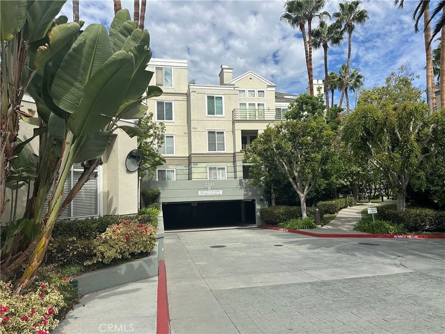 Irvine mid-rise condo living at its finest! This bright and spacious 2-bedroom PLUS den which can be used for 3rd bedroom or office and 2-bathroom condo is 1204 SF and is located in a luxurious building with amazing amenities. The condo features large bedrooms and closets, a great room with fireplace, an in-unit washer and dryer, a private balcony and two assigned parking spots in the subterranean garage (near guest parking). An elevator serves all levels of the building. Clean and ready for immediate move in.   Community amenities include pool, hot tub, fitness room, clubhouse, 24-hour gated entrance and onsite management services. The HOA dues cover gas, water, sewer and trash fees. It is convenient to John Wayne Airport, plus shopping, dining and entertainment. You need to see to fall in love with.