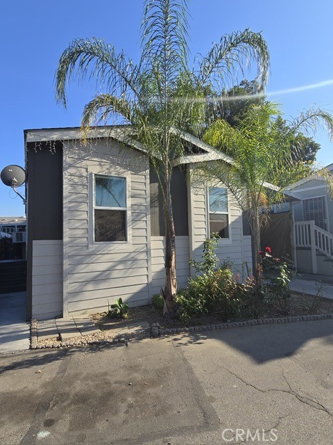 Move-in ready mobile home with modern comforts and great location. This 3-bedroom, 2-bathroom mobile home located in a desirable all-ages community in El Monte. This home features an open floor plan with a large living room, dining area, and a bright kitchen with ample cabinetry and counter space. The primary bedroom includes an en-suite bathroom, while the additional bedrooms are perfect for family, guests, or a home office.
Interior highlights include wood-style flooring, laundry hookups, and generous storage throughout. Exterior features include a private carport, small yard space, and access to community amenities such as a clubhouse and swimming pool.
Conveniently situated near schools, parks, shopping centers, restaurants, and major freeways.
Ideal for families or first-time buyers.