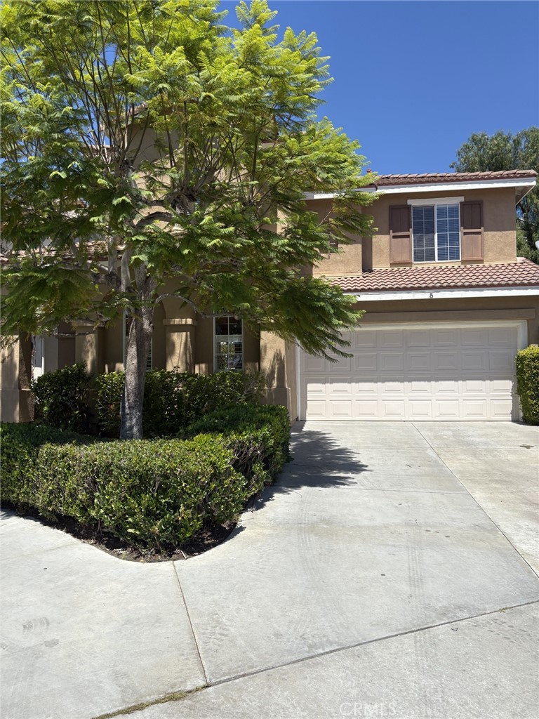 Welcome to your new home! This spacious 3 bedroom, 2 1/2 bath residence is perfectly tucked inside a gated community and sits right across from a peaceful park- perfect for evening strolls or weekend playtime. Step inside and enjoy the modern updates throughout. Just recently remodeled bathrooms with stylish vanities, brand new carpet flooring on the stairs and hallway, brand new refrigerator and microwave oven, wood-like flooring throughout downstairs, wood flooring in principal bedroom and one secondary one upstairs, new paint. All bedrooms upstairs. Outdoors, you will find the perfect retreat. A private backyard with lush trees, built-in BBQ and fire pit, ideal for entertaining, no house behind it for extra privacy. A convenient driveway for parking and new epoxy flooring in the two-car garage. Near shopping centers, restaurants, and toll road access. (professional photos coming soon!)
