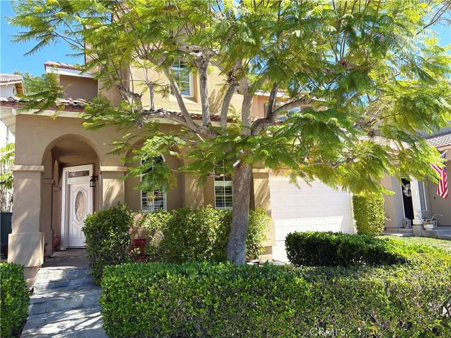 Major price reduction! Located in the desirable gated community of Village Cottages in Aliso Viejo, this 3-bedroom, 2.5-bathroom home offers comfort, convenience, and a family-friendly environment. This residence is perfectly tucked inside the community and sits right across from Oak Park- perfect for evening strolls or weekend playtime. Step inside and enjoy the modern updates throughout. Just recently remodeled bathrooms with stylish vanities, brand new carpet flooring on the stairs and hallway, wood-like flooring throughout downstairs, bamboo flooring in principal bedroom and the secondary one upstairs, brand new refrigerator and microwave oven, new paint. All bedrooms upstairs. Outdoors, you will find the perfect retreat. A private backyard with lush trees, built-in BBQ and fire pit, ideal for entertaining, no house behind it for extra privacy. A convenient driveway for parking and new epoxy flooring in the two-car garage. Enjoy the benefits of top-rated schools within walking distance. Near shopping centers, restaurants, and toll road access. Move in ready. Motivated homeowner.