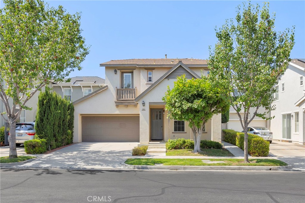 Move-in ready two-story home in the desirable Northwood community, located within the award-winning Irvine Unified School District—Canyon View Elementary, Sierra Vista Middle, and Northwood High. This detached residence offers 4 bedrooms, 2.5 bathrooms, and 2,105 sq. ft. of living space, plus an attached 2-car garage with epoxy flooring and a driveway for two additional cars. The main level features two spacious living areas: a bright formal living room at the entry, perfect for a sitting area, home office, or playroom, and an open-concept family room with a cozy gas fireplace that flows into the kitchen. The kitchen boasts granite countertops, a center island with an integrated sink, abundant cabinet space, and direct garage access. A deep storage closet under the stairs provides extra space to keep belongings neatly tucked away. Flooring includes wood and tile downstairs, with carpet in all upstairs bedrooms. The primary suite offers a walk-in closet and ensuite bath with a double vanity, soaking tub, and walk-in shower. The laundry room is conveniently located upstairs with extra cabinetry for storage. The backyard features a mix of concrete patio and mature landscaping in a wrap-around layout, providing easy access from the kitchen and dining area—perfect for entertaining. Gardening service is included. Enjoy Northwood amenities, including a community pool within walking distance. Conveniently located near Culver Dr. and Portola Pkwy with easy access to shopping, dining, and major freeways. NO PETS & NO SMOKING.