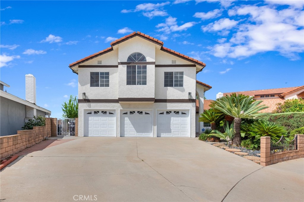 Spacious and versatile two-story home located on a quiet cul-de-sac in the heart of Montebello. This 5-bedroom, 3-bathroom residence offers approximately 2,846 sq. ft. of living space on a 7,160 sq. ft. lot, ideal for multi-generational living, entertaining, or long-term investment.
Built in 1972, the home boasts a classic layout with formal living and dining areas, a central fireplace, and an abundance of natural light. The kitchen provides generous cabinetry and cooking space, with potential for modern upgrades. Bedrooms are thoughtfully distributed across both levels, offering flexibility and privacy. Additional highlights include central air and heat, a tile roof, and a 3-car garage with ample driveway parking.
Enjoy city views from the backyard and proximity to local parks, schools, shopping centers, and major freeways (I-5, I-710, SR-60)—all just minutes from Downtown Los Angeles. This is a rare opportunity to own a generously sized home in a well-established neighborhood