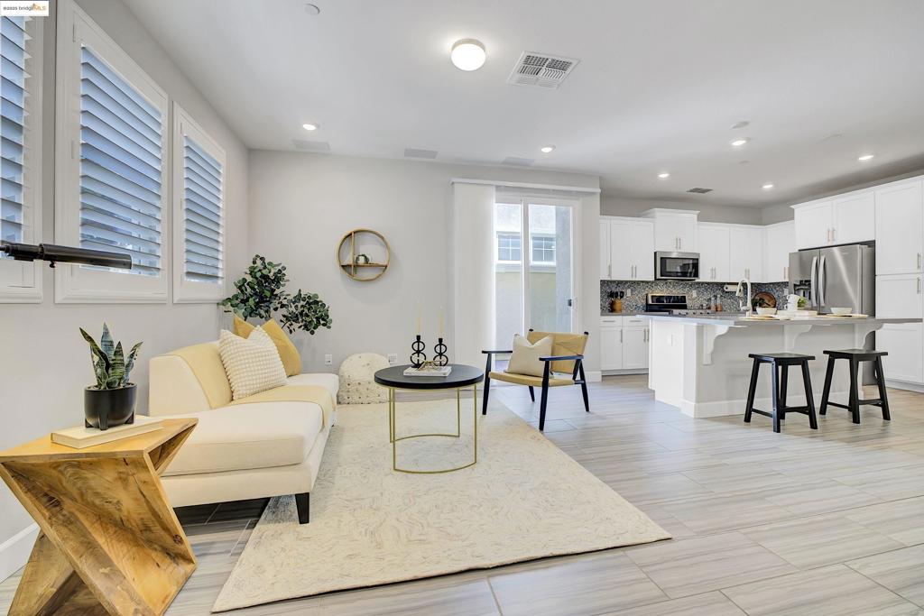 Welcome home to a bright and spacious contemporary property located at 24237 Nora Circle in the Mt. Eden neighborhood of Hayward. Built in 2018, this home offers just under 1,700 sqft of living space with 4 bedrooms and 2.5 bathrooms. The primary suite is a standout feature, complete with an ensuite bathroom and a walk-in closet. The home also comes equipped with modern amenities like surround sound speakers, custom Hunter Douglas Shutters, and an electric vehicle charging setup in the garage. Conveniently located, this home is right around the corner from Greenwood Park and provides easy access to BART, the San Mateo Bridge, and major highways 880 and 238, making it an ideal choice for commuters. This beautifully maintained home gets excellent natural light and is a great opportunity to own a property in the heart of the Bay Area.