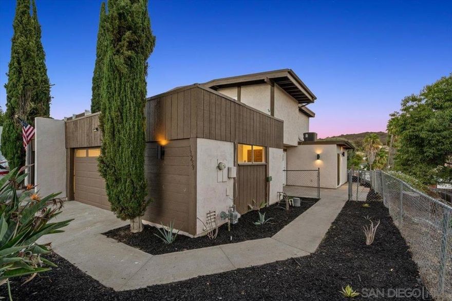 Welcome to 13259 Saddle Ridge Road, a beautifully refreshed 4-bedroom, 2-bath home in the heart of Lakeside. One common wall but lives like a single family with large private yard. This move-in-ready residence has been thoughtfully upgraded throughout, offering a perfect blend of comfort, style, and modern convenience. The home features a brand-new kitchen with updated cabinetry and finishes, remodeled bathrooms with fresh vanities and fixtures, and all-new flooring and paint in light, neutral tones that create a bright and welcoming atmosphere. Energy-efficient new windows flood the home with natural light, while the new garage door enhances both curb appeal and functionality. Step outside to enjoy the inviting backyard, a private space ideal for relaxing, entertaining, or soaking up Southern California sunshine. Built in 1974 and updated to today’s standards, the home offers 1,373 square feet of living space on a 4,000 square foot lot. Located in the quiet Lakeview neighborhood, you’ll enjoy proximity to Lakeview Elementary and the convenience of nearby shopping, dining, and outdoor recreation. With its modern upgrades, functional layout, and welcoming outdoor space, 13259 Saddle Ridge Road is the perfect opportunity to own a stylish, move-in-ready home in a desirable Lakeside community.