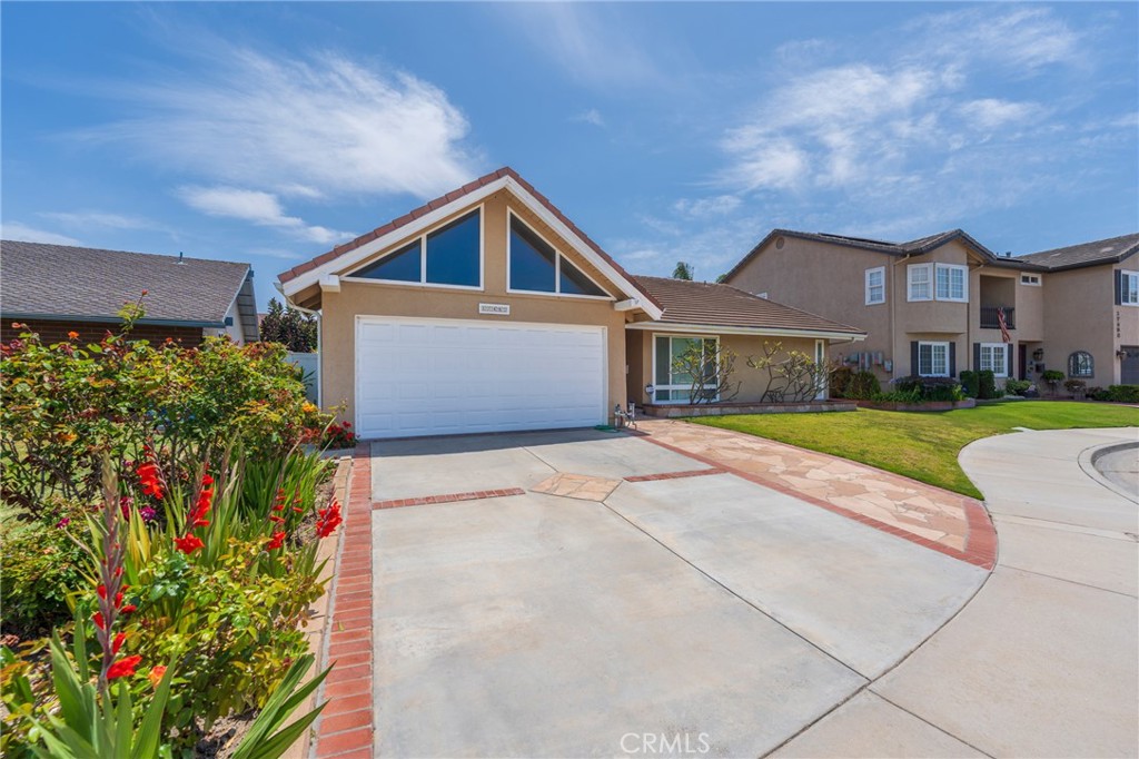 ENJOY this Elegant, Completely Remodeled 4 Bedrooms, 2 Bathrooms Single Family Detached House on a Quiet and Safe Cul-de-Sac Street. Totally Remodeled Kitchen with Granite Countertops, White Custom Cabinets, Brand New Stainless Steel Dishwasher, Matching Stainless Steel Appliances. OPEN Concept layout with High Ceilings for Comfort and Wood-like Tile Flooring adds Elegance. Large Enclosed Patio Room brings in abundant Natural Light and offers a Tranquil Outdoor Retreat. Earth-tone Tile Shower Enclosures, Matching Granite Counters in Bathrooms along with Self Shut-off Light Fixtures. MATURE Fruit Trees in the Backyard. You can Feel the Cool Ocean Breezes from the Ocean less than One Mile Away. Just across the street from Marina View Park, Meadowlark Golf Club and couple miles away from Huntington Beach Park, Library and Equestrian Center. The Relaxing and Scenic Bike and Walking Trail leading Directly to the Beach and Bolsa Chica Wetlands runs literally behind the House and the Cul-de-Sac. This BEAUTIFUL House Welcomes you to make it Your DREAM HOME.