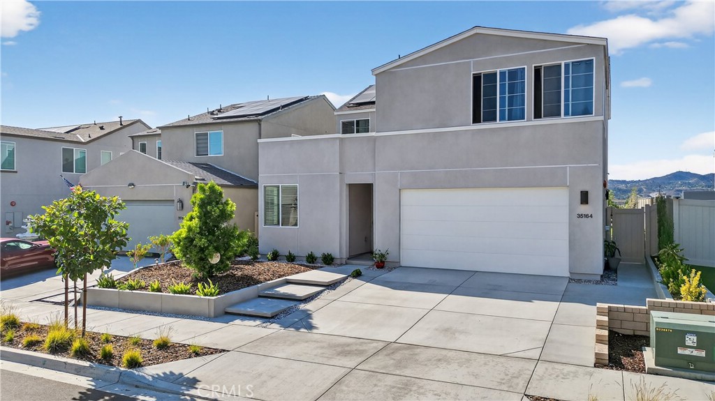 Nestled in the scenic hills of Fallbrook and surrounded by lush avocado and orange groves, this stunning 2023-built home offers the perfect blend of modern comfort and natural tranquility. Located in a quiet, family-friendly community within the highly rated Bonsall Unified School District, this property is ideal for families seeking space, privacy, and connection to nature.
With breathtaking mountain and sunset views, this thoughtfully designed home offers a serene backdrop for everyday life. The low-maintenance yard features mature trees that provide natural shade, fresh air, and a sense of calm privacy. Whether you're enjoying your morning coffee on the balcony or watching the sun dip behind the mountains, this home invites you to slow down and take in the beauty of your surroundings.
Tucked away in a peaceful enclave, the neighborhood is known for its quiet streets, sense of community, and access to outdoor recreation. Fallbrook’s charming downtown, local wineries, hiking trails, and equestrian facilities are just a short drive away, making it a dream location for those who value both convenience and lifestyle. Inside, the home features a spacious and functional layout perfect for growing families or those who love to entertain. High-quality finishes, large windows, and an open floor plan create a bright and welcoming atmosphere.
Located just 20 miles from the Oceanside pier and 48 miles from Downtown San Diego, this home offers the rare combination of country charm and city accessibility, where coastal breezes meet mountain views.
