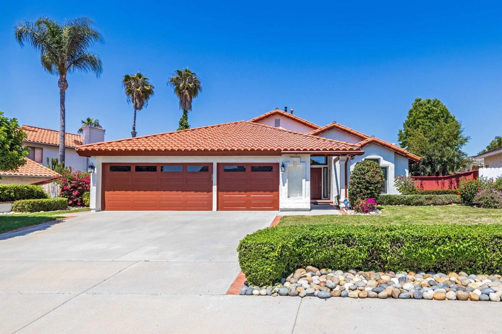 Welcome to 718 Lockwood Street – a stunning, fully updated single-story gem in the heart of Oceanside. Every inch of this home has been thoughtfully upgraded with modern elegance and functionality in mind. Step inside to all-new luxury vinyl plank flooring and be captivated by the sleek quartz countertops and custom backsplash in the gourmet kitchen. Both bathrooms have been reimagined with designer tilework, including a luxurious master suite featuring a walk-in closet and spa-like shower. The secondary bath offers a premium experience with its custom tile shower and overhead rain-style showerhead. The home boasts recently updated dual-pane windows for improved energy efficiency and comfort. Fresh interior and exterior paint, elegant matte gold finishes throughout, and stylish new ceiling fans and recessed lighting add a refined touch to every space. The expansive backyard is enclosed with a brand-new stucco wall, featuring a beautifully restored water fountain—perfect for peaceful relaxation or lively entertaining. A spacious three-car garage with brand new epoxy floors offers ample storage and workspace. This move-in ready home combines premium upgrades with timeless style—no detail was overlooked. Come experience comfort, beauty, and quality craftsmanship all in one place.
