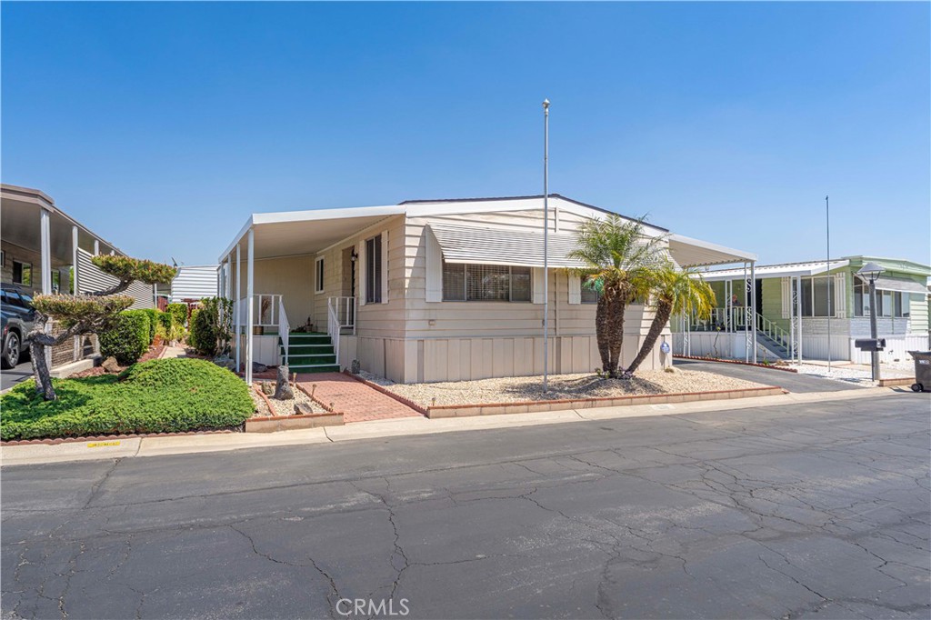 Double-Wide Mobile Home in La Verne, CA in 55+ Foothill Terrace Mobile Home Park for Sale! Foothill Terrace is a Well-Maintained 55+ Park located in La Verne close to Shopping, Restaurants, Public Transportation, Hospitals & Airports. This Lovely Home Features Brand New Roof, 2 Bedroom, 2 Bathrooms, Bonus Room, 1,596 Sq. Ft, Laundry Area w/ Gas & Electric Hookups, Central Air / Central Heat, Driveway. Community amenities, include swimming pool, gym, club house, library.