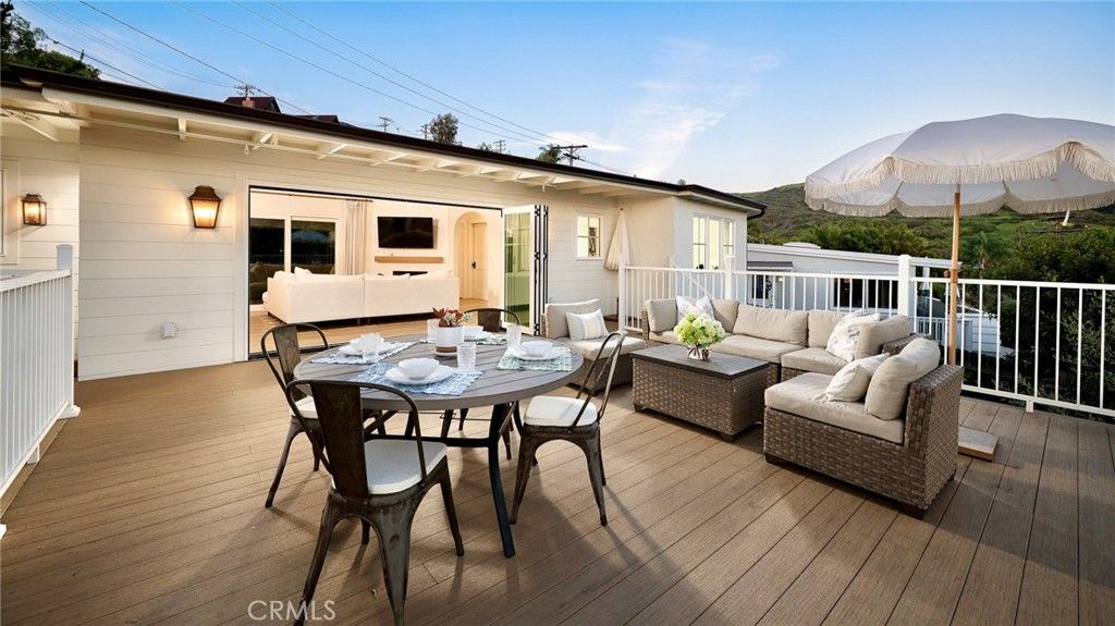 Photo of 1445 Bluebird Canyon Dr, Laguna Beach, CA 92651 (MLS # LG25272972)