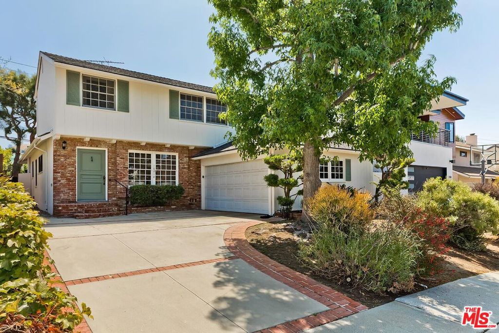 Perched in the coveted Culver Crest hills, this stunning two-story Mid-Century home combines timeless design with sweeping city views. Set on a serene street in one of Culver City's most sought-after neighborhoods, the home offers 3 bedrooms, 2.5 baths, and generous living spaces designed for comfort and connection. The bright living room looks out over a tree-lined street, while the expansive family room features sliding glass doors that open to a spacious deck, patio, and private backyard perfect for entertaining or relaxing outdoors. Upstairs and down, natural light and open layouts create a warm, inviting atmosphere. Just minutes from the vibrant shops and acclaimed dining of downtown Culver City, and within the district of award-winning Culver City schools, this home offers the best of both worlds: a peaceful retreat above the city with unmatched convenience below.