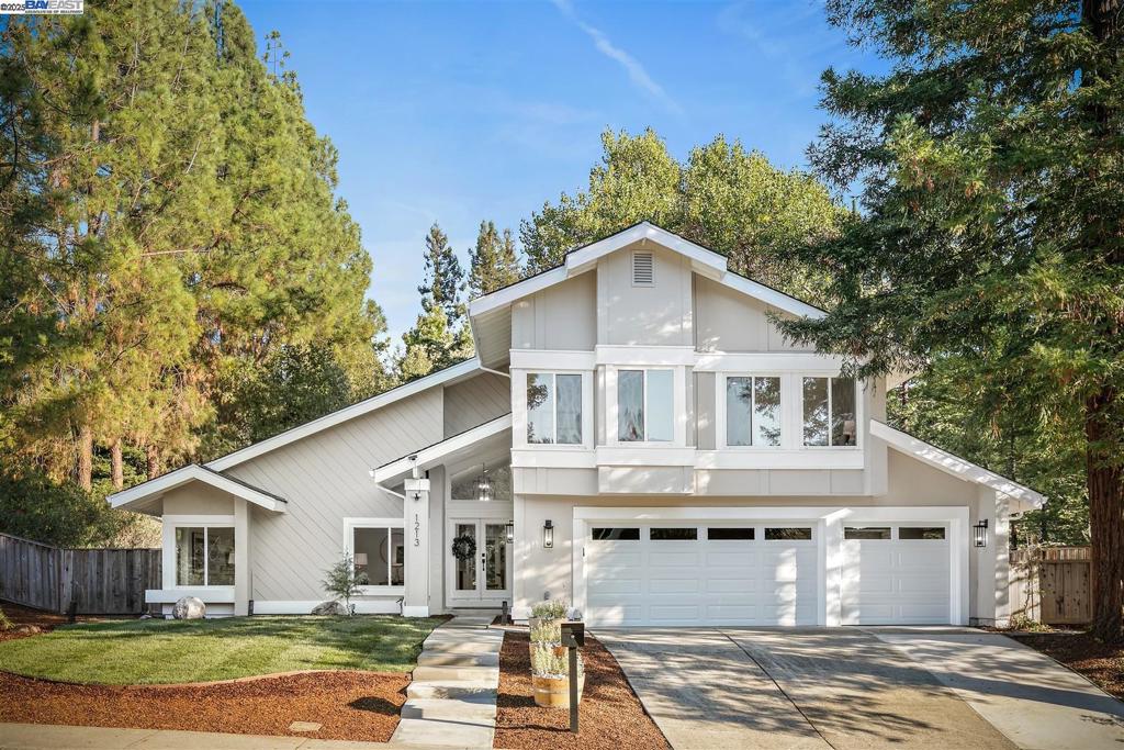 Situated on a premium corner lot, 1213 Dutch Mill is one of the most stunning homes in sought-after Danville Crest! This magazine-worthy, fully renovated 4-bedroom, 2.5-bath home showcases incredible curb appeal and an entertainer’s dream backyard featuring a large paved patio, lush new lawn, and your very own backyard zipline! The light-filled interior welcomes you through a custom glass front door into vaulted living spaces. The chef’s kitchen boasts sleek black stainless-steel appliances, quartz countertops, and designer finishes. The cozy step-down family room offers a classic fireplace and direct access to the backyard. Upstairs includes a spacious primary suite plus three additional bedrooms and a stylish hall bath. Enjoy dual-pane windows, premium upgrades throughout, and a location close to Downtown Danville, Iron Horse Trail, and freeway access all within the award-winning San Ramon Valley School District. Low HOA!