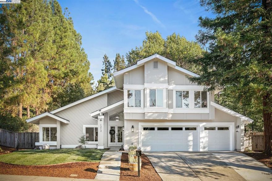 Situated on a premium corner lot, 1213 Dutch Mill is one of the most stunning homes in sought-after Danville Crest! This magazine-worthy, fully renovated 4-bedroom, 2.5-bath home showcases incredible curb appeal and an entertainer’s dream backyard featuring a large paved patio, lush new lawn, and your very own backyard zipline! The light-filled interior welcomes you through a custom glass front door into vaulted living spaces. The chef’s kitchen boasts sleek black stainless-steel appliances, quartz countertops, and designer finishes. The cozy step-down family room offers a classic fireplace and direct access to the backyard. Upstairs includes a spacious primary suite plus three additional bedrooms and a stylish hall bath. Enjoy dual-pane windows, premium upgrades throughout, and a location close to Downtown Danville, Iron Horse Trail, and freeway access all within the award-winning San Ramon Valley School District. Low HOA!