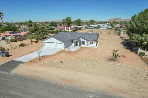 Photo of 19590 Red Feather Road, Apple Valley, CA 92307 (MLS # HD26212417)