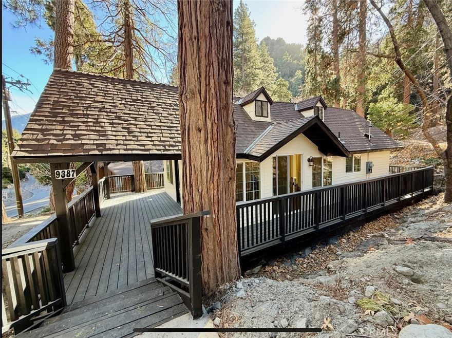 Hidden Gem in the San Bernardino Mountains – Close to the City!

Discover the perfect blend of mountain serenity and modern convenience in Forest Falls! This beautifully remodeled 2-bedroom, 1-bath home offers the charm of mountain living without the long commute. With over 70% of the home updated, this stunning retreat is move-in ready!

Key Features:

Open-Concept Design – Vaulted ceilings and skylights create a bright, airy atmosphere.

Brand-New Kitchen – Featuring a spacious island and elegant quartz waterfall countertops.

Wrap-Around Patio – Every room has patio doors leading to a brand-new wrap-around deck, ideal for taking in the fresh mountain air and breathtaking views.

Rare Single Car Garage, Two separate parking areas, one large enough for an RV!

Outdoor Enthusiast’s Paradise – Enjoy nearby hiking trails, picnic areas, and the renowned Vivian Creek Trail just minutes away!

Per seller, the home’s square footage is slightly larger than currently reflected in county records and will be updated soon. Buyer/Buyer's agent to verify all details.

Don’t miss this incredible opportunity to own a slice of mountain paradise!
