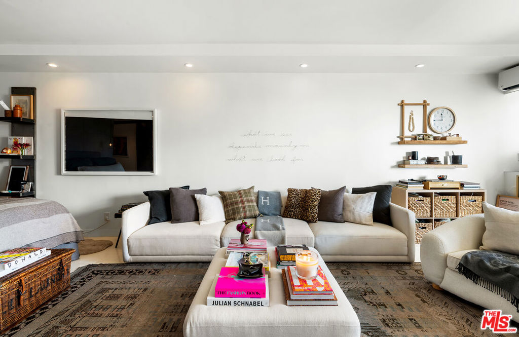 Experience luxury living in this highly sought-after, west-facing studio, offering exceptional closet space, abundant storage, and breathtaking views of Beverly Hills with sunsets extending out to the ocean. No expense was spared in the impressive $8.5 million building renovation, which was just completed this year. Situated in a prime, secure neighborhood, you're just steps from trendy restaurants, exclusive clubs, Beverly Hills shopping, and the best lifestyle offerings LA has to offer. Residents also enjoy year-round access to a heated saltwater pool, spa, gym, sauna, steam room, valet, and 24-hour doorman. This is a rare opportunity to own a renovated, high-floor unit in a prestigious full-service building.