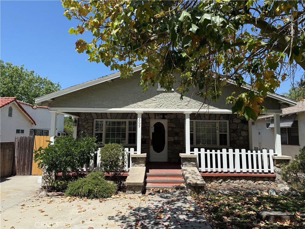 Welcome to 609 N Vermont Ave, a beautifully updated home nestled in the heart of Glendora. This charming residence offers 3 spacious bedrooms and 2 modern bathrooms across a thoughtfully designed floor plan. The home features a bright and inviting living area, hardwood flooring, recessed lighting, and a renovated kitchen complete with quartz countertops, custom cabinetry, and stainless steel appliances. Both bathrooms have been tastefully remodeled with contemporary finishes. Enjoy California living in the expansive backyard, perfect for entertaining or relaxing under mature trees. Additional highlights include central HVAC, a detached two-car garage, and a long driveway for ample parking. Located in a highly sought-after neighborhood close to schools, parks, shopping, and downtown Glendora. This is a must-see property you won't want to miss!
