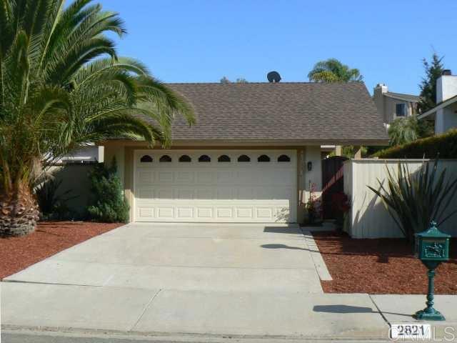 Desirable 1 level twin-home. Open floorplan with excellent light (skylights/sola-tubes). Stylish & updated with wood floors throughout, recessed lighting, custom paint/window coverings, refrigerator, fireplace, ceiling fans, AC, & much more...2 car garage and large back/side yards (monthly landscaper included). Excellent schools...just a few blocks from the award winning La Costa Meadows Elementary. Located on a quite low traffic street with great shopping & restaurants near by.