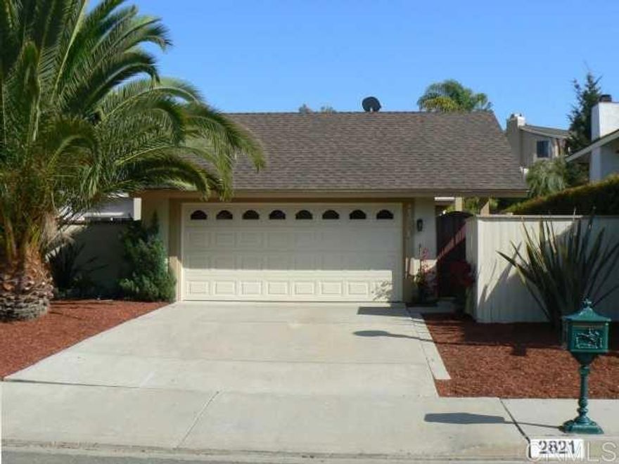Desirable 1 level twin-home. Open floorplan with excellent light (skylights/sola-tubes). Stylish & updated with wood floors throughout, recessed lighting, custom paint/window coverings, refrigerator, fireplace, ceiling fans, AC, & much more...2 car garage and large back/side yards (monthly landscaper included). Excellent schools...just a few blocks from the award winning La Costa Meadows Elementary. Located on a quite low traffic street with great shopping & restaurants near by.