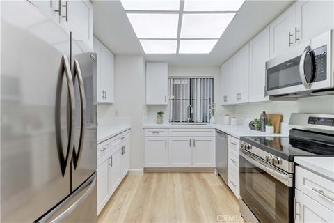 Photo of 8877 Lauderdale Court #210-G, Huntington Beach, CA 92646 (MLS # OC26128809)
