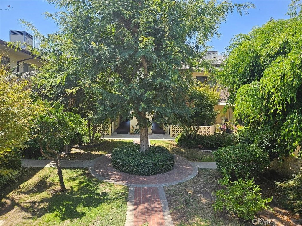 Located in the heart of downtown Glendale. Gated, clean, open floor plan and bright top floor unit facing a very nice courtyard. Freshly painted, new carpet floors, central heat & air, enclosed car garage. Almost 700 sf., 2 blocks to Brand Blvd. and Porto's Bakery, 4 blocks to Americana, the Galleria and Glendale Boulevard. Near restaurants, banks, groceries, post office, transportation & YMCA. Only 20 units in a condominium complex. No unit below you - below the unit is a garage.