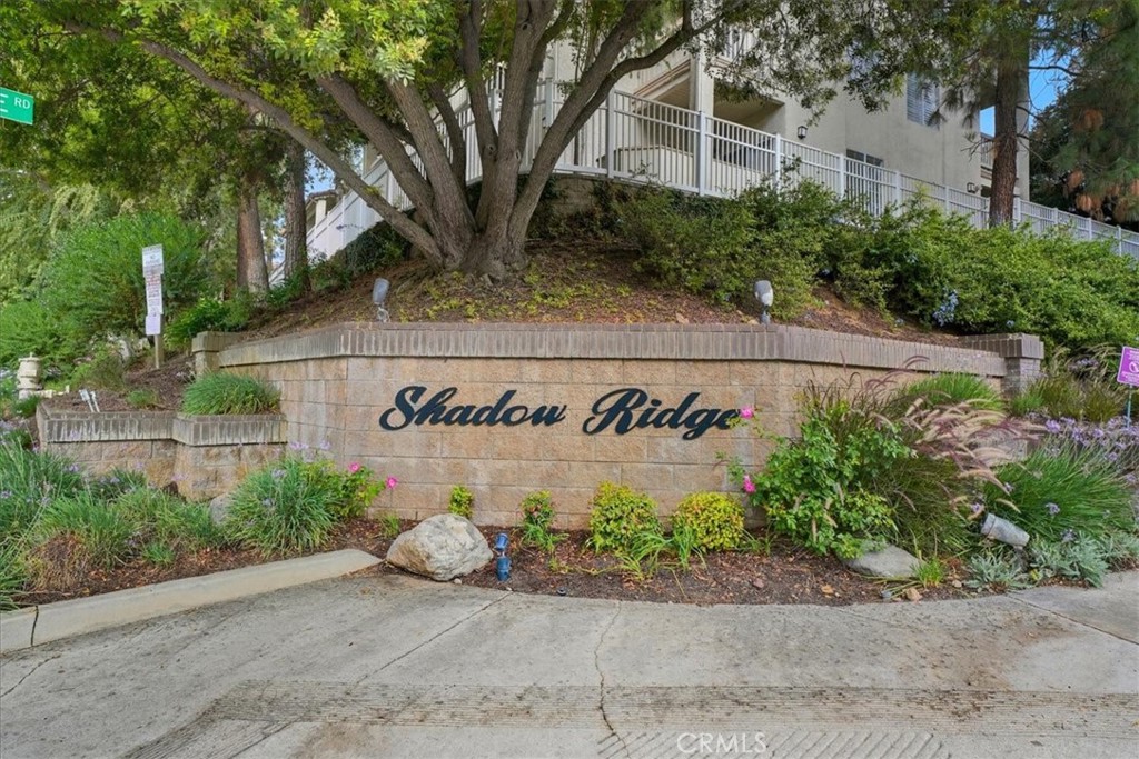 Quiet Top-Floor Unit | Vaulted Ceilings | Resort-Style Amenities This Private and peaceful top-floor unit tucked away at the back of the complex, away from street noise. Features vaulted ceilings with no one above, a spacious open-concept living area with cozy fireplace, and a sun-drenched private patio overlooking the complex and rolling hills. The Primary bedroom includes a walk-in closet, and the large kitchen offers an oversized counter perfect for dining and entertaining. In-unit laundry on the patio is a real convenience. Parking is very close by (spot 1066) and lots of guest parking. Water heater is about a month old, Refrigerator, Washer and Dryer are included. Community amenities include two sparkling pools and spas, fitness center, three indoor racquetball courts, basketball, volleyball and tennis courts, clubhouse, BBQ area, and a private dog park. HOA includes cable TV and trash. Ideal location—close to hiking trails, grocery stores, Costco, restaurants, coffee shops, and easy access to the 101 freeway.