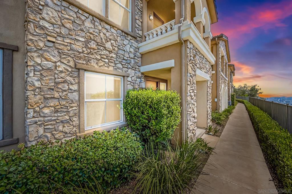 Step into elevated living at 1110 Calabria Street —a beautiful 3-bedroom, 3.5-bathroom townhouse in the Northstar community at Sky Ranch. Perched atop the hills of Santee, this home welcomes you with breathtaking panoramic views right out your front door. Inside, this tri-level residence blends style, function, and comfort. Each spacious bedroom features its own private en-suite bathroom, including a first-floor suite ideal for guests, extended family, or a home office. The bright and airy main level boasts an open-concept layout with wood flooring and an oversized living and dining space, perfect for entertaining. The kitchen includes granite countertops, an expansive island, walk-in pantry, and plenty of cabinet space. Enjoy a private balcony with scenic hillside views, a 2-car attached garage, and easy access to all three nearby freeways (52, 67, and 8). Sky Ranch offers resort-style amenities including a sparkling pool and spa, BBQ area, clubhouse and playground. Located just minutes from Santee Town Center, Costco, Trader Joe’s, parks, and hiking, this is more than a home—it’s a lifestyle surrounded by natural beauty, comfort, and convenience.