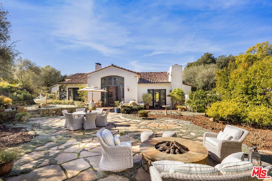 Nestled in the exclusive Ennisbrook community, this pristine and private single-story Spanish Colonial casita boasts beautiful gardens and mountain views. Immerse yourself in the intimate and spacious open floor plan of this gorgeous residence, featuring well-defined spaces that seamlessly connect to the outdoors. Exquisitely designed this home features 2 beds + a bonus room, and 2.5 baths. Showcasing a delightful dining room, charming kitchen, and adorned with high-quality finishes, wood floors, and French doors throughout, the residence is a testament to refined living. Bathed in natural light, the elegant living room with a vaulted ceiling is anchored by a handsome fireplace. French doors from nearly every room lead to the enchanting grounds and showcase the stunning gardens.The Ennisbrook community features a range of amenities, including two pools, tennis and pickleball courts, a fitness center, clubhouse, park, and the breathtaking 44-acre Ennisbrook Preserve. Located in Montecito, close to hiking, beaches, the Rosewood Miramar, and Lower and Upper Villages.