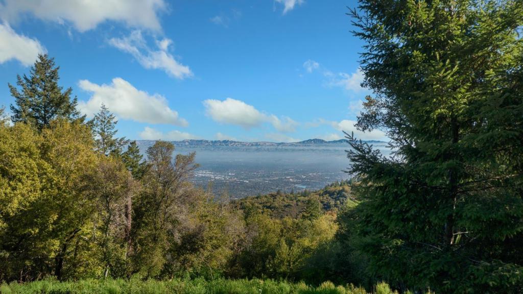 Architectural & Site approval should be complete by August 22 to 30th! Spectacular lot set along the ridge of Bohlman Road with incredible vistas of the valley and SF Bay. Architectural work through Tom Sloan of Metro Design Group, a highly respected and talented local architect. Stylish contemporary design with warm appointments. One has the benefit of a neighborhood feel with the privacy of mountain living provided by this wonderful setting and location. All the site engineering is complete including Geotechnical and Geological reports, a drilled well with water quantity and quality reports, Percolation test and report for Septic system, Survey and Topographical maps. Site, elevations and plan details for Architectural approval through the Planning department of County of Santa Clara available. Current home design for approximately 3,845 sf +/- in total not including Cabana and outdoor kitchen nor 605 sf +/- garage, set upon 13.28 net acres +/-. Saratoga Schools!