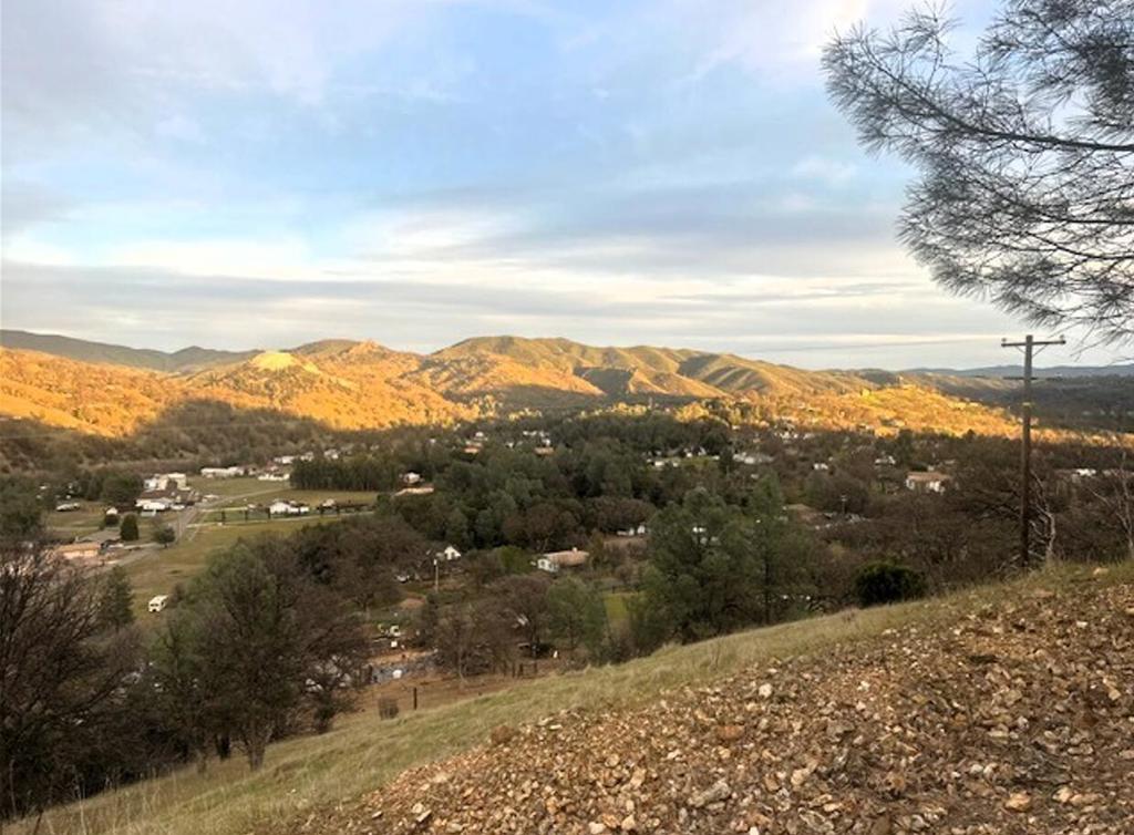 Escape to the peaceful serenity of Clearlake Oaks with this 2.30-acre vacant lot offering stunning mountain views. Great for building your dream home or vacation getaway, this property is located in a quiet community known for its natural beauty and outdoor recreation. Enjoy easy access to Clearlake, California's largest natural freshwater lake, for boating, fishing, and watersports, or explore hiking and birdwatching in nearby areas. The lot is also close to local wineries, restaurants, and coffee shops, making it a location for those seeking a peaceful retreat with convenient access to amenities. Whether you're looking for a place to build your custom home or simply a tranquil spot to unwind, this property offers endless potential