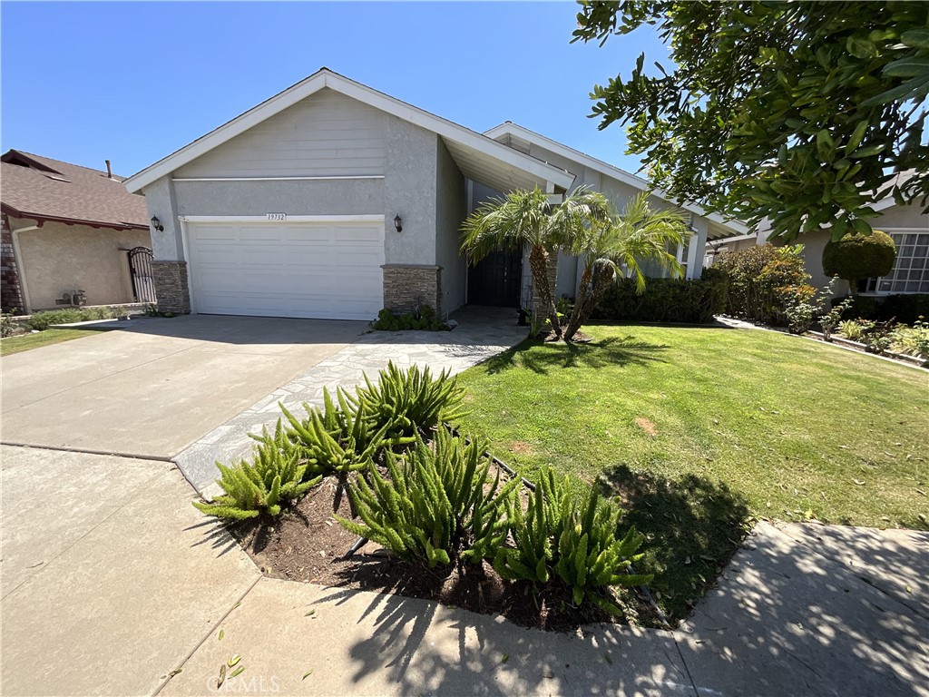 Remodeled with high-end features, this home offers modern comfort, energy efficiency, and versatile living spaces. Designed for today’s lifestyle, the home is equipped with solar panels that significantly reduce or even eliminate electricity bills, providing monthly savings of $300–$400, along with an electric car charging station.
The spacious layout includes three large bedrooms and three full bathrooms. At the heart of the home, a massive family room opens seamlessly to the remodeled kitchen, where an impressive island with seating for six and a convenient utility sink make cooking and entertaining effortless. The living room flows naturally into the family areas, creating open, inviting spaces ideal for gatherings of all ages.
The master retreat is a true sanctuary, complete with a sitting area, a walk-in closet, and a spa-inspired remodeled bathroom featuring a gorgeous glass-enclosed walk-in shower. The master suite also has direct access to a winterized sunroom that can serve as an office, playroom, or business space within the home. The second bedroom is equally impressive with its own walk-in closet and a remodeled en-suite bathroom with a walk-in shower, making it perfect for extended family or guests. The third bathroom has also been updated and features a shower over the tub.
Every detail of the remodeling has been completed with top-of-the-line fixtures and appliances, ensuring quality throughout. The garage offers finished flooring and built-in storage, adding both function and style. Situated on a quiet cul-de-sac, the property enjoys easy access to parks, trails, and shopping, while families will appreciate the nearby award-winning Placentia-Yorba Linda schools.