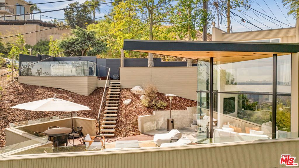 Photo of 7187 Macapa Drive, Los Angeles, CA 90068 (MLS # 25612625)