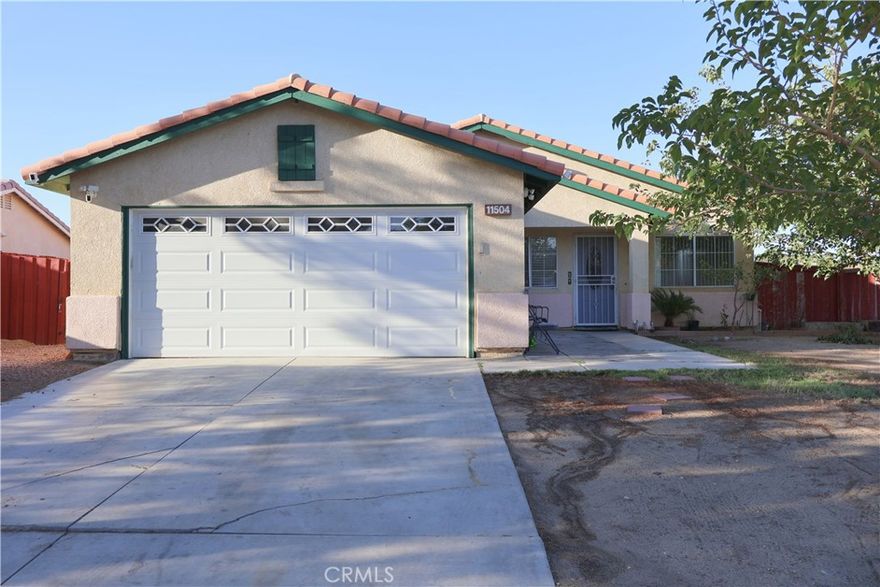 Welcome to this inviting 4-bedroom, 2-bathroom home in the growing city of Adelanto. Offers plenty of space and comfort for the family. Featuring new flooring throughout the living area with grand ceilings that make the home feel light and inviting. All bedrooms have carpet. Kitchen offers a functional layout with room to modernize. Enjoy family meals or gatherings in this spacious dining area, complete with a cozy fireplace to set the perfect atmosphere. The home also offers a 2-car garage, providing ample parking and storage. Step outside to find a comfortably-sized backyard and front yard, giving you plenty of room for outdoor activities, gardening, or entertaining. With its functional layout and solid features, this home is a wonderful opportunity to make it truly your own. Thanks for viewing!